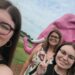 Kendra Gregory with her mom, sister, and (we promise) an actual pink elephant.